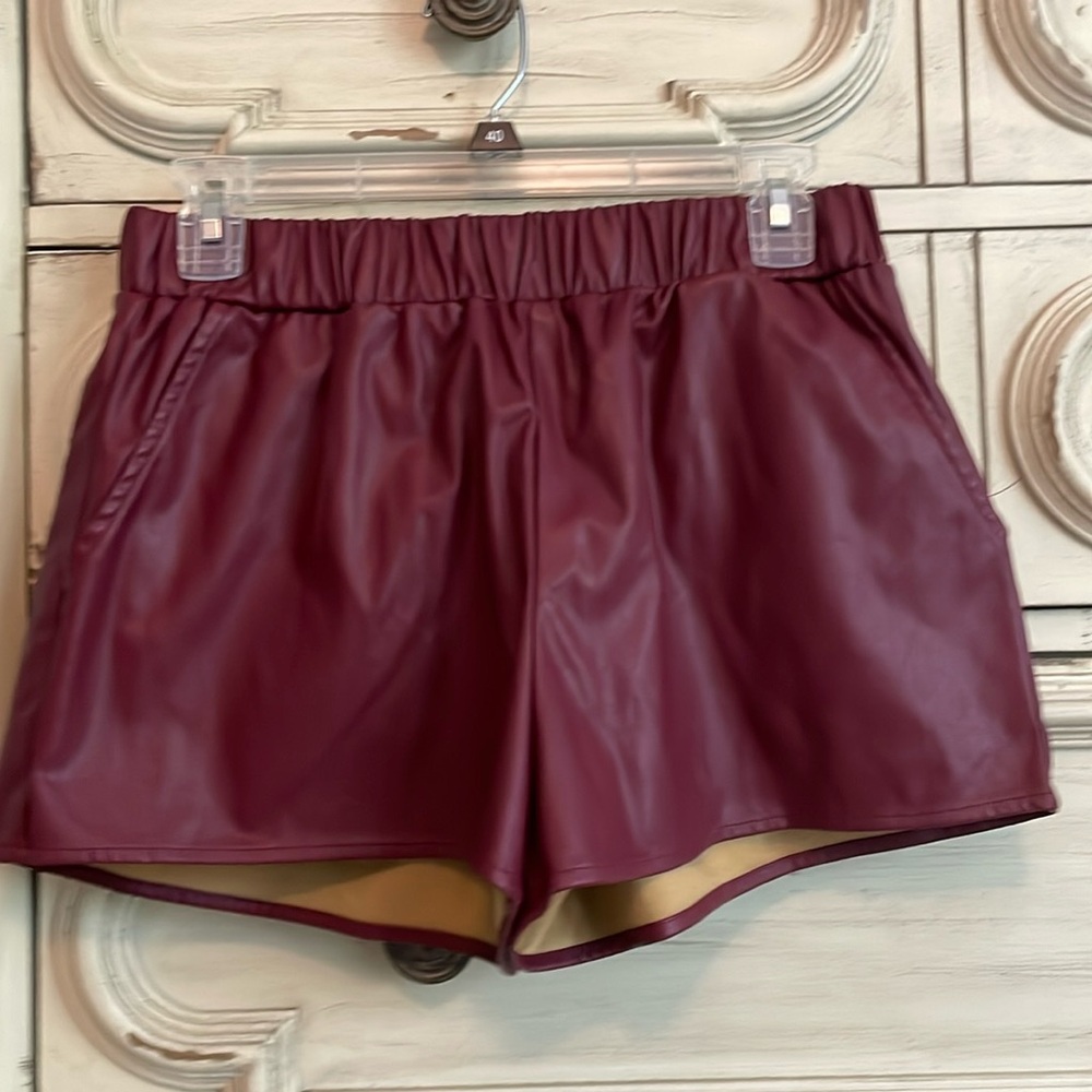 Women’s maroon size medium poly blend shorts